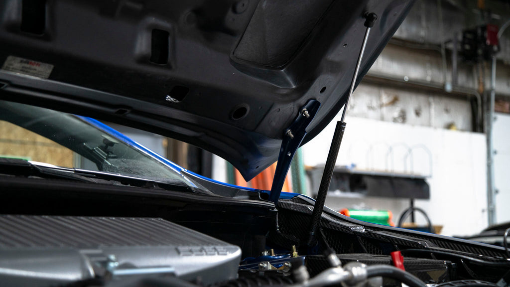 OLM Carbon Fiber Wrapped Hood Struts - 2022+ WRX
