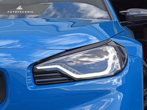 AutoTecknic Carbon Fiber Headlight Trim Set - G87 M2