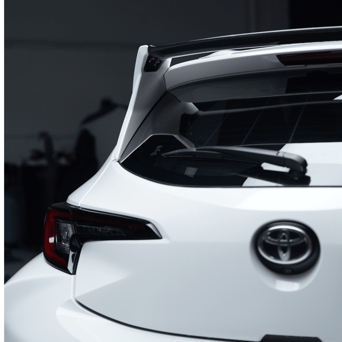 Toyota GR Corolla Paint Matched/Gloss Black/Carbon Fiber Spec D Rear Spoiler